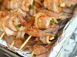 Wrap 1 bacon slice half around 1 shrimp and 1 piece of jalapeño pepper. Bacon Wrapped Jalapeno And Cheese Stuffed Shrimp Eat Alabama Seafood