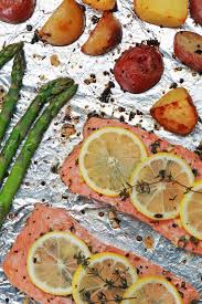 One Pan Salmon And Veggie Dinner Veggie Dinner Seafood Recipes Salmon Recipes
