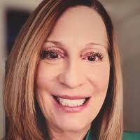 With Gina Edmonds at the Schwab sponsor table, WP&BC Spring Conference,  Temp, AZ.