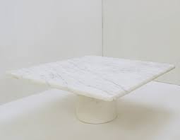 Include a touch of extravagance and complexity to your living room or family room with a marble topped coffee table. Square White Marble Coffee Table 1970s 172315