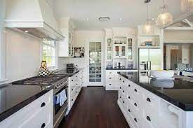Dark golden brown dark walnut kitchens dark espresso kitchens. 36 Inspiring Kitchens With White Cabinets And Dark Granite Pictures Backsplash For White Cabinets Black Countertops Black Granite Countertops