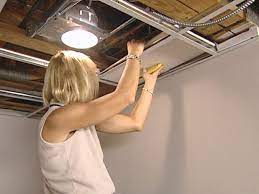 Lay down a drop cloth and set up a ladder so you can access the recessed lighting fixture. How To Install An Acoustic Drop Ceiling How Tos Diy