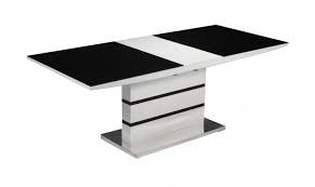 This casual, contemporary dining table is big, bold and natural. Aldridge High Gloss Dining Table White With Black Glass Top