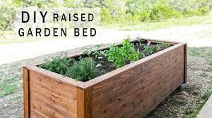 The garden boxes are connected by a trellis. Project Of The Week Raised Garden Bed Real Cedar
