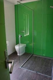 22 Modern Bathroom Ideas Blending Green Color Into Interior Design And Decor Back Painted Glass Toilet Design Glass Shower