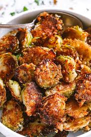 Looking for some easy vegetable side dishes to serve at your next family gathering or weeknight dinner? Garlic Parmesan Roasted Brussels Sprouts Vegetable Recipes Veggie Dishes Healthy Recipes