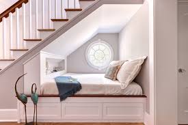 Under the cushion, there is a small bed frame with the previous under stair ideas are all about humans. Dustin Peck Photography Bunk Under Stairs Southern Studio Interior Design Under Stairs Nook Stair Nook Staircase Design