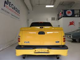 Image result for Federal Safety Yellow 2002 Truck