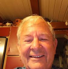 What is the identity of the tree with weeping branches and horizontal  stripes