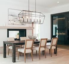 Transitional green dining room design with chandelier. Transitional Dining Tables To Fit Every Style Gabby Home