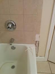 Repairing Tub Leg Water Damage Water Damage Bathroom Repair How To Repair Drywall