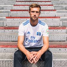 Our hsv shirt selection goes from the 1970s up to the present day and includes lots of variations on the classic white and red home colours, plus match worn uniforms and training apparel. Hamburger Sv Reveal Their 2018 19 Home Kit By Adidas