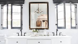 The storage looks wealthy that can store towels and ornaments. Modern Old World Master Bathroom Emily Henderson