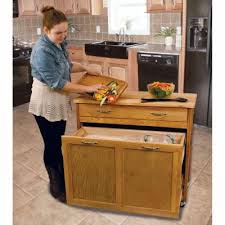 The basket is fit with a garbage bin for easy disposal. With Trash Bin Kitchen Islands And Carts Hayneedle