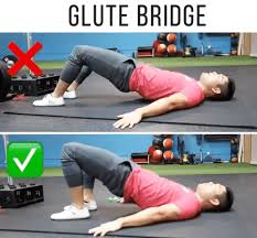 Lie down with your knees bent and your feet flat on the floor. 5 Benefits Of The Glute Bridge Barbend