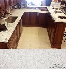 This Kitchen Countertop Features Serra From Our Quartz Line Reminiscent Of A Crisp White Granite This Su Kitchen Design Kitchen Countertops White Granite