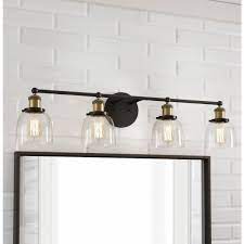 Save on all bathroom lighting! Home Decorators Collection Evelyn 4 Light Artisan Bronze Vanity Light Hb2628 313 The Home Depot Bronze Vanity Lighting Black And Gold Bathroom Black Bathroom Light