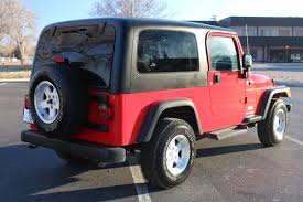Image result for Flame Red 2005 Jeep