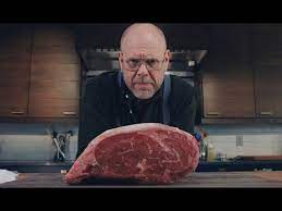 Lots of fat marbling the meat and large pockets of fat interspersed throughout. Alton Brown S Holiday Standing Rib Roast Youtube Standing Rib Roast Rib Roast Prime Rib Roast Recipe