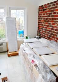 Priming In Progress Young House Love Painting Kitchen Cabinets Home Diy Home