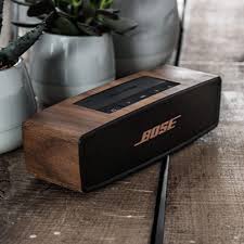 The weight is about and a half pounds and the dimensions of this speaker are 7.1 x 2.3 x 2.0 inches. Bose Soundlink Mini I Ii Walnut Wood Cover Balolo