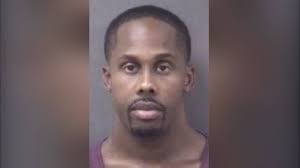 Police say Devon Brown was in the mall for at least 20 minutes while his  three children, ages 2 to 10 years old, waited in the car.