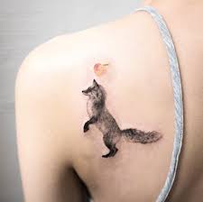 Both men and women can get shoulder tattoos; Black Ink Fox Back Shoulder Tattoo Amazing Tattoo Ideas