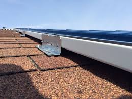 Is a leading manufacturer of metal roofing Mcelroy Metal Srecovers Asphalt Shingles Commercial Construction And Renovation