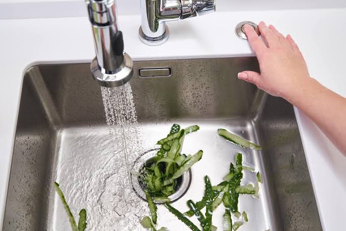  Clean a Kitchen Drain With a Garbage Disposal