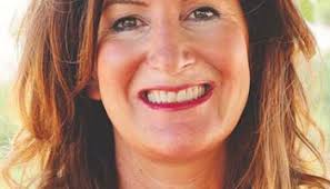 Political expert David Mullinax speaks to Rotary