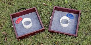 The game field consists of two washer pits, each containing one recessed cup of 4 inches in diameter (101.6 mm) positioned a specific distance apart, toward which players throw washers to score points. Washer Toss Game Rules Scoring Diy How To Win