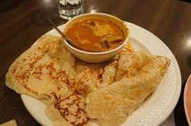 Roti Canai With Curry Sauce Malaysia Https Cookpad Com Us Recipes 420805 Roti Canai Malay Curry Sauc Roti Canai Recipe Curry Recipes Curry Chicken Recipes