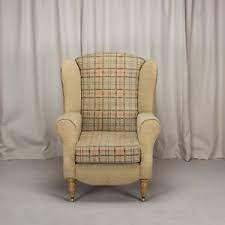 The design features of the leather wing back chair offer a few creature comforts, as listed below: Duchess Wingback Chair Gold Check Fabric Fireside Armchair Front Castors Uk Ebay