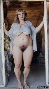 Porn image of nude woman tall barefoot thick thighs 70 medium shot created  by AI
