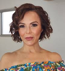 kindly put us in a wedding gown and also tidy my wife's hair, thanks in  advance.