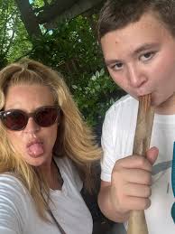 Worked half the day- then a lil play before the rain with my youngest  nephew! We were able to get in four rides in a couple hours before the  bottom dropped out-