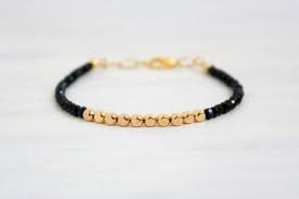 Black And Gold Bracelet For Babies Dainty Chic Minimalist Stack Bracelet Boho Black And Gold Beaded Bracelet By Tribomo Baby Jewelry Gold Gold Bead Bracelets Black Beaded Jewelry