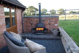 Pin By Heidi Featherstone On Garden Outdoor Wood Burner Outdoor Wood Burning Fireplace Outside Wood Stove