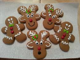 Gingerbread Men And Reindeers Christmas Cookies Decorated Reindeer Gingerbread Cookies Gingerbread Reindeer