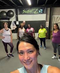 Sweating it out in Richard's Zumba class