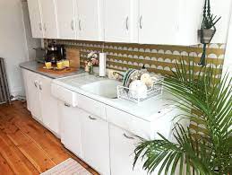 This Small Apartment Has A Super Cute Stylish Temporary Kitchen Backsplash Rental Kitchen Makeover Rental Kitchen Rental Kitchen Makeover Temporary