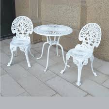 Finished with a blackened patina, the undulating surfaces and porous quality of the cast metal top imbue the table with organic vitality, while slender, tapered legs and the top's reverse beveled edge lighten the look and keep the lines clean. Cast Aluminum Outdoor Table And Chairs Balcony Small Coffee Table Combination Garden Chair Three Piece Outdoor Chair Table Set Garden Furniture Sets Aliexpress