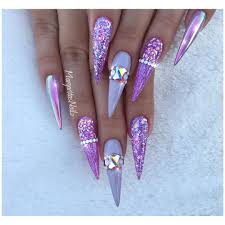 But, if you do prefer bolder nail art, then this mani shows how to wear purple in a more statement making way. Purple Stiletto Nails Chrome And Glitter Nail Art Design Purple Stiletto Nails Stiletto Nails Designs Bling Acrylic Nails