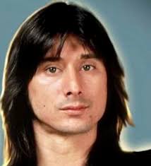 Steve in his suspenders and trucker hat