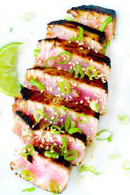 Easy grilled tuna steak recipe including a savory lime soy dipping sauce. Six Minute Seared Ahi Tuna Steaks