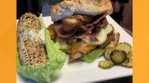 Olivias dishes out a Southern Style Pecan Chicken on a biscuit