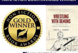 Book Award Winner: Wrestling With Demons: In Search of the Real Ernest  Hemingway by Curtis L. DeBerg - Nonfiction Authors Association