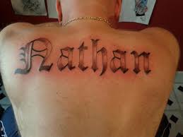 Name tattoos are not always plain and simple and they may have some beautiful decorations and designs around it. Name Tattoos On Back Tattoo Image Collection