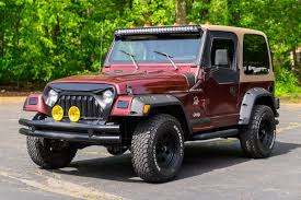 Image result for Salsa Red 2002 Jeep