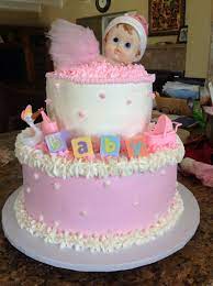 Pink And White Girl Baby Shower Cake With Bby Figurine Baby Shower Cakes Girl Homemade Cakes Baby Shower Cakes